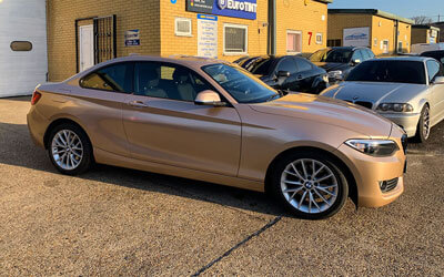 BMW WRAPPED CHAMPAGNE GOLD WHITE CITY